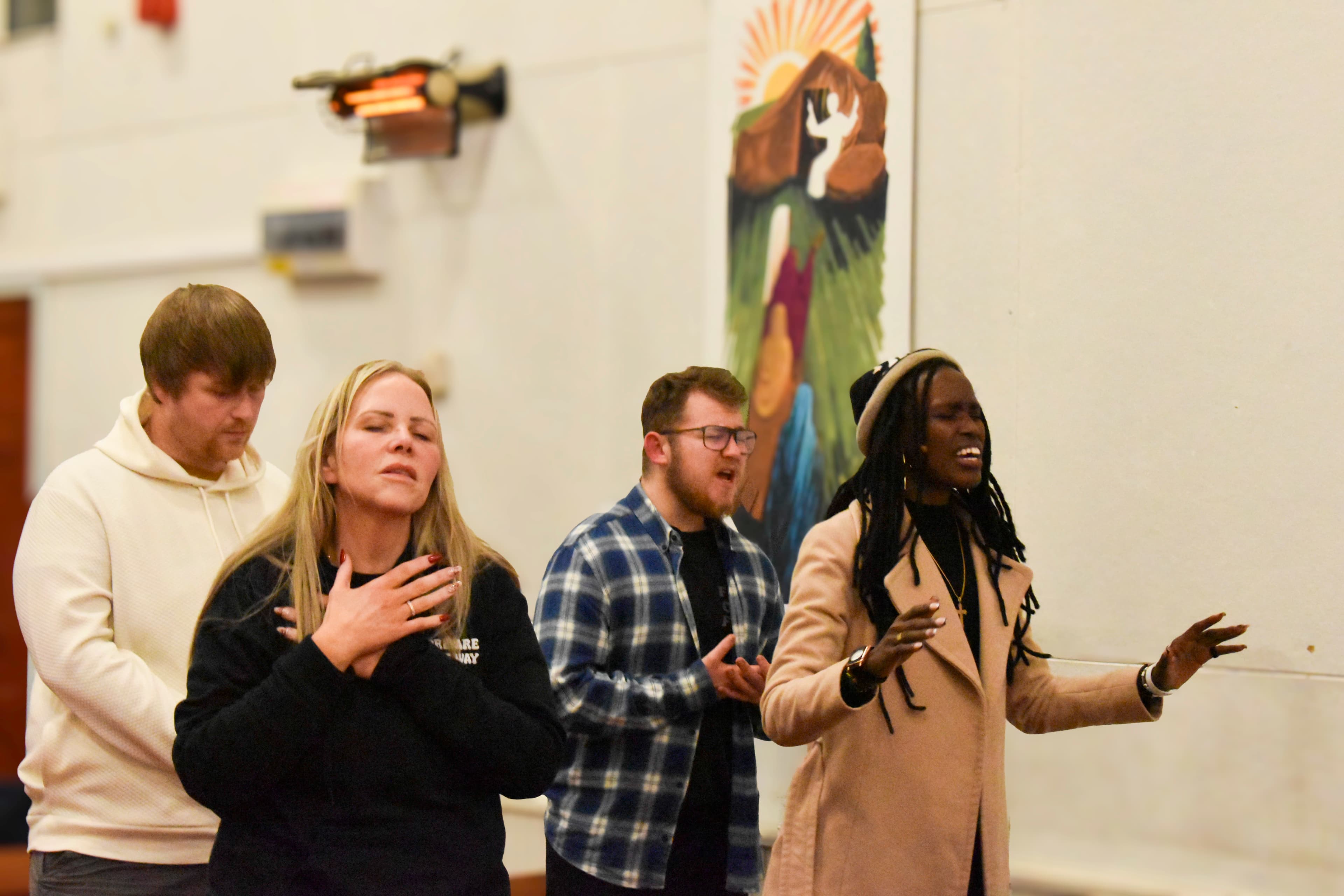 Sunday Worship – Word and Spirit Embassy Congregation worshipping during a service at our Church in Liverpool
