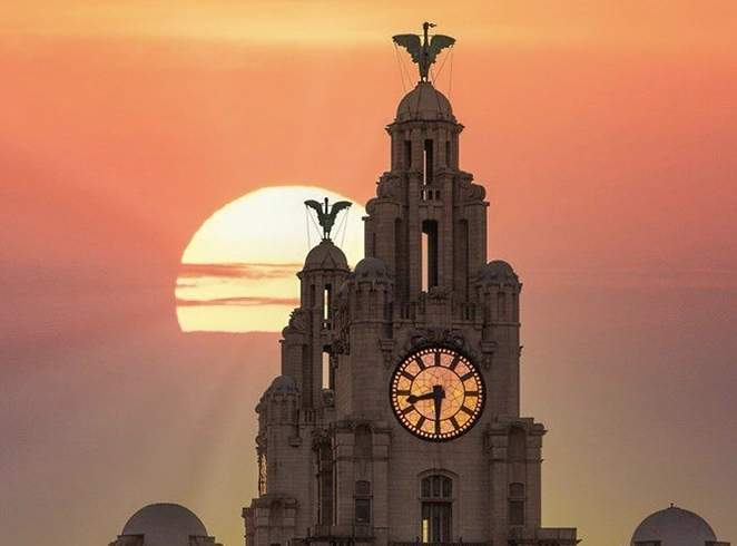 Spirit-Led Church in Liverpool | Word and Spirit Embassy Royal Liver Building at sunset representing our Church in Liverpool community